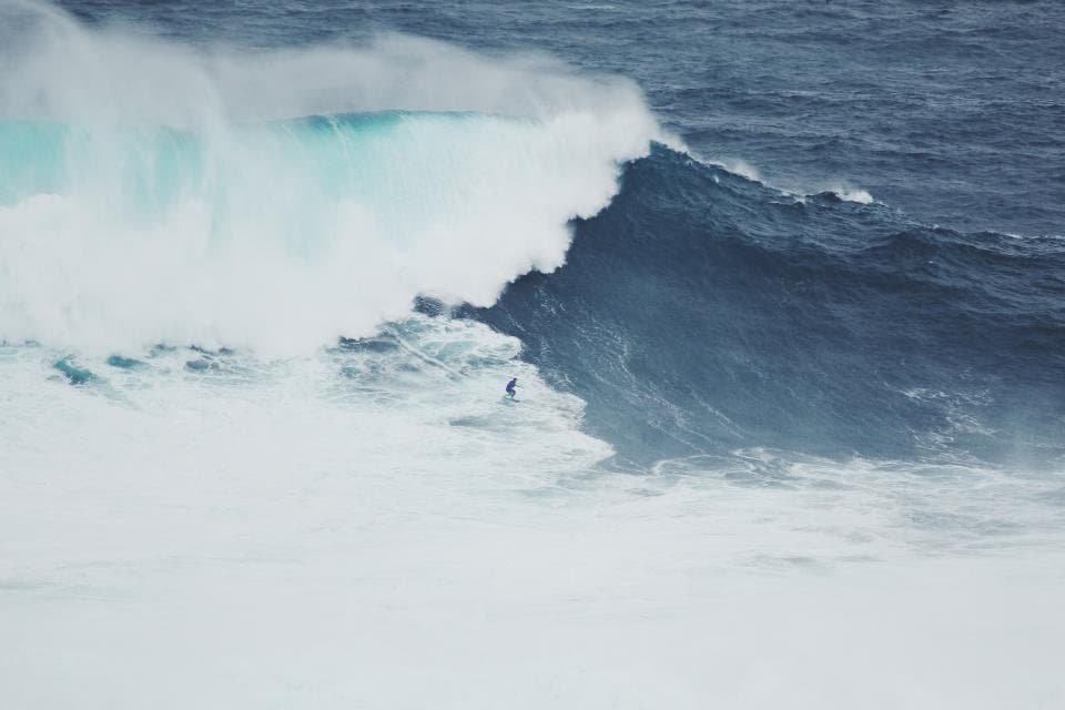 A huge wave breaking out at sea